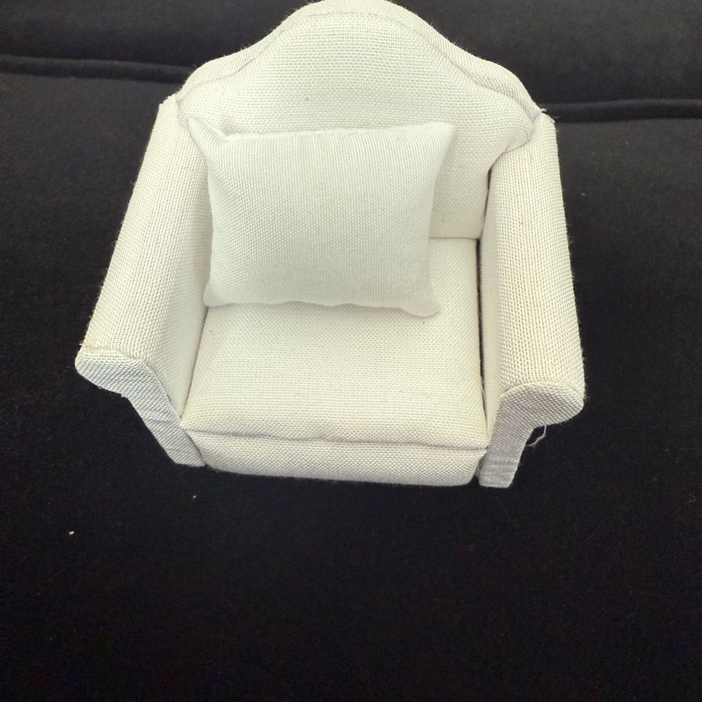 Brand new Miniature Cream labubu. Armchair/ couch